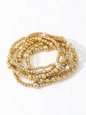 Elegant Gold and Pearl Stacked Bracelet Set
